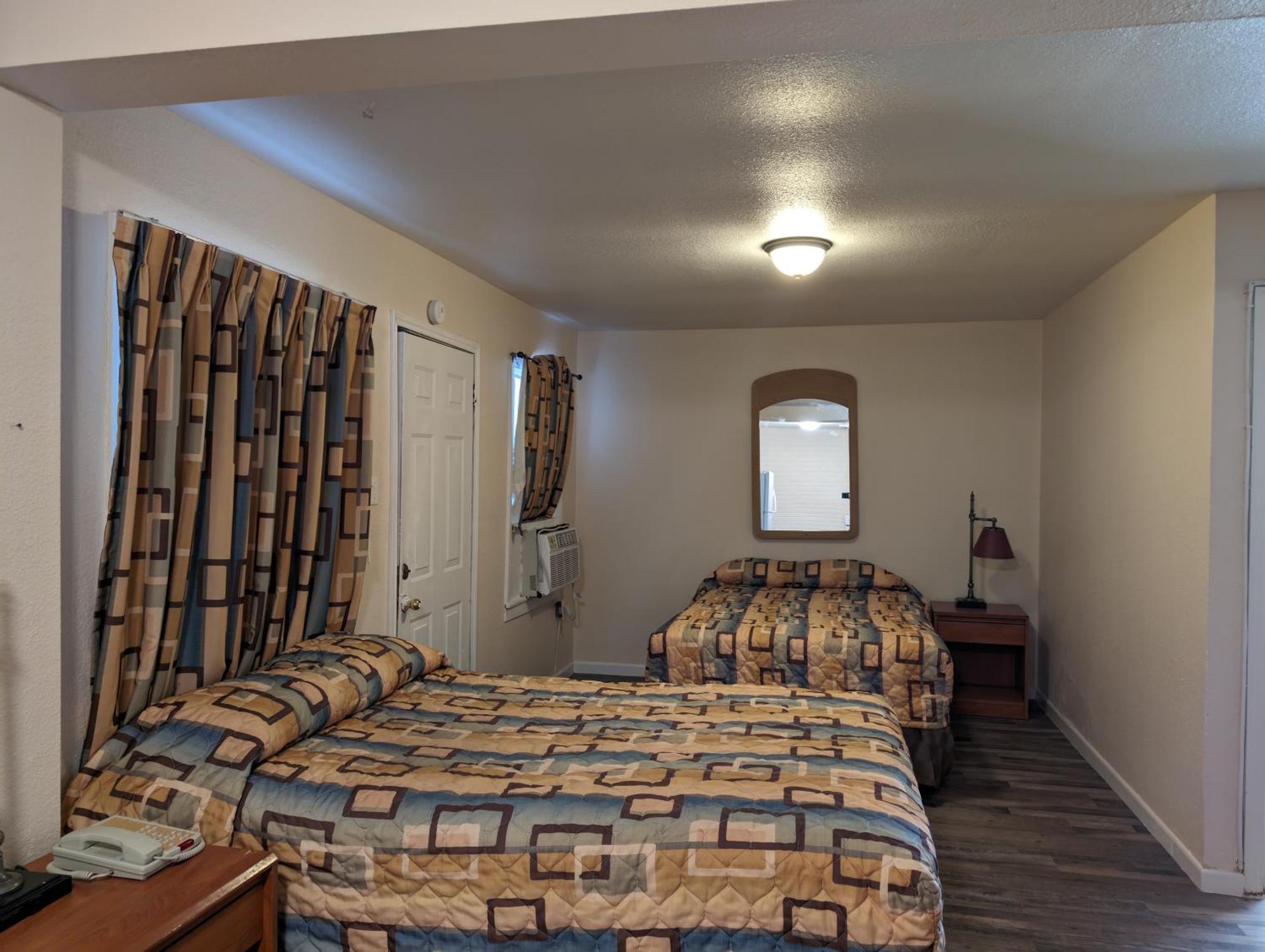 Economy Inn Кингсвилл Экстерьер фото